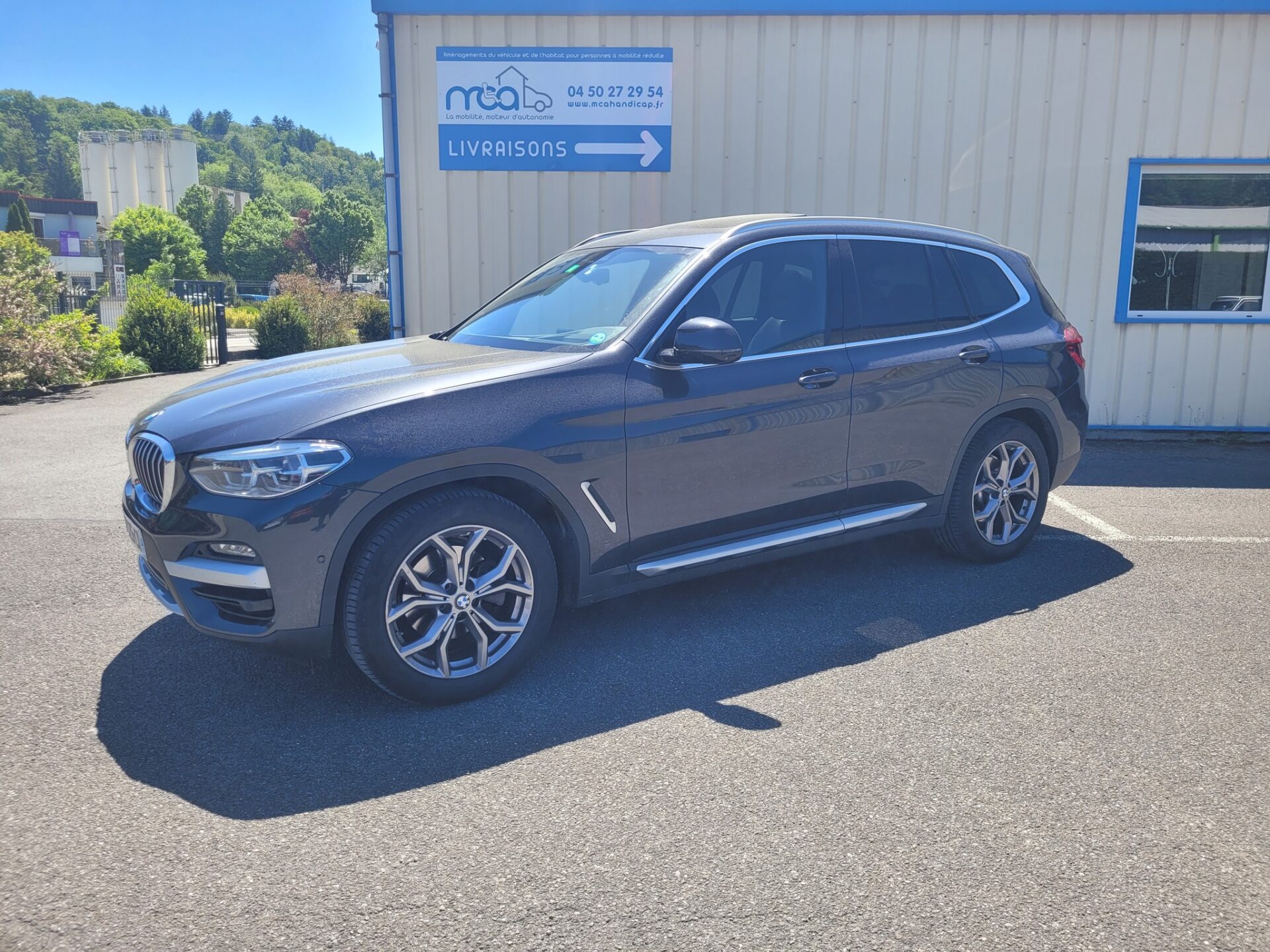 Installation d'une Grue de Coffre Carolift 40 par Braun Ability dans une BMW X5